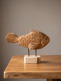 Poisson en Teck